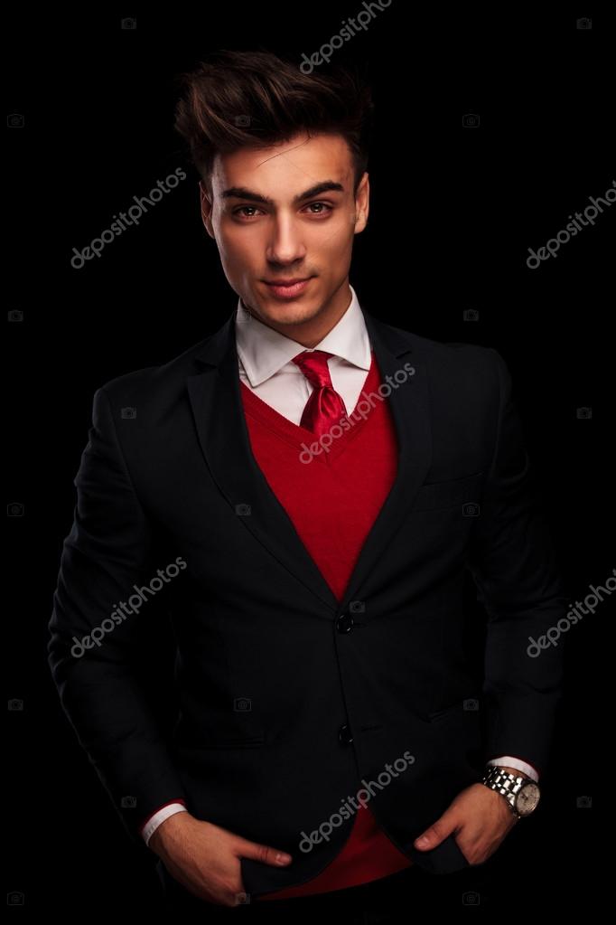 Elegant Man Black Suit Red Tie Looking Camera Isolated Black Stock Photo by  ©IgorVetushko 350791920