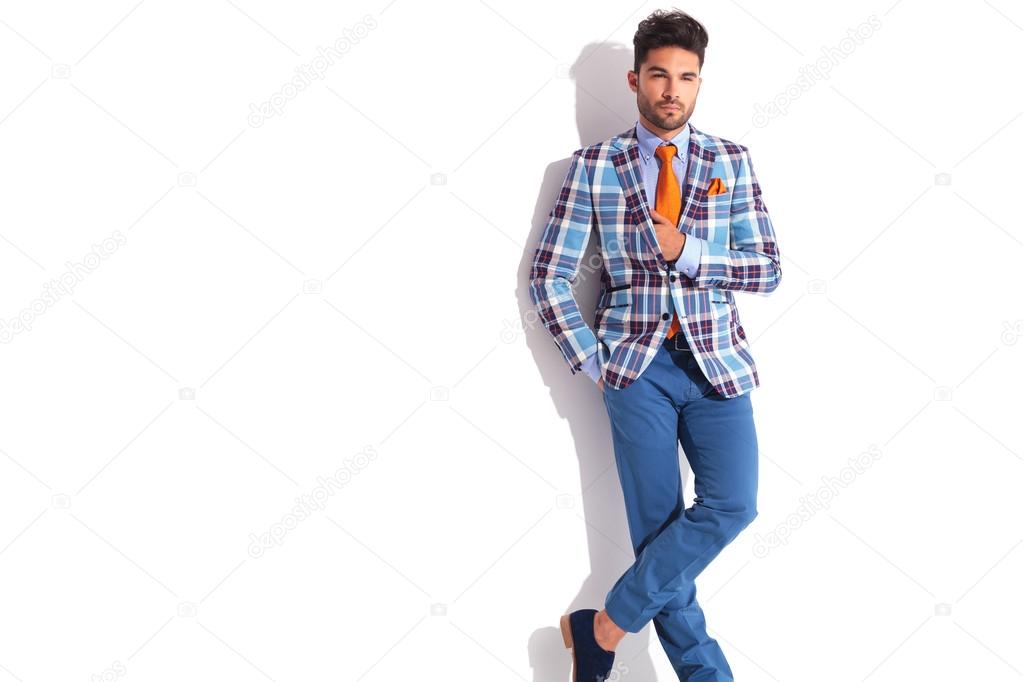 man with hand in pocket posing