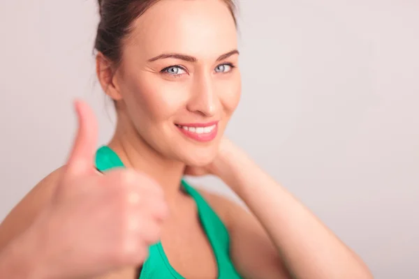 Happy woman making the ok sign — Stock Photo, Image
