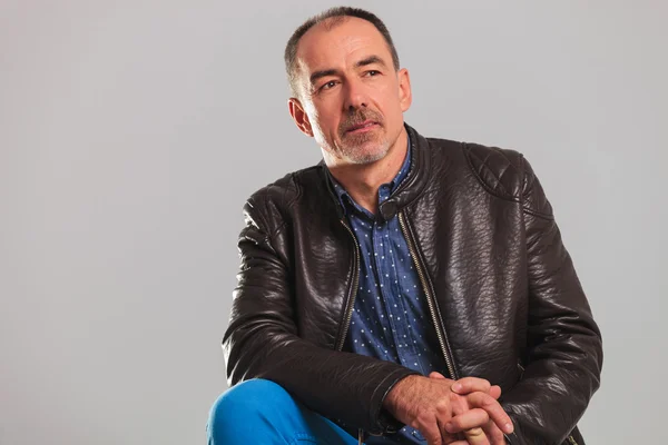 Side view of a mature casual man in leather jacket — Stock Photo, Image