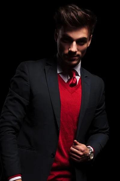 Dramatic portrait of a sexy young businessman smiling — Stock Photo, Image