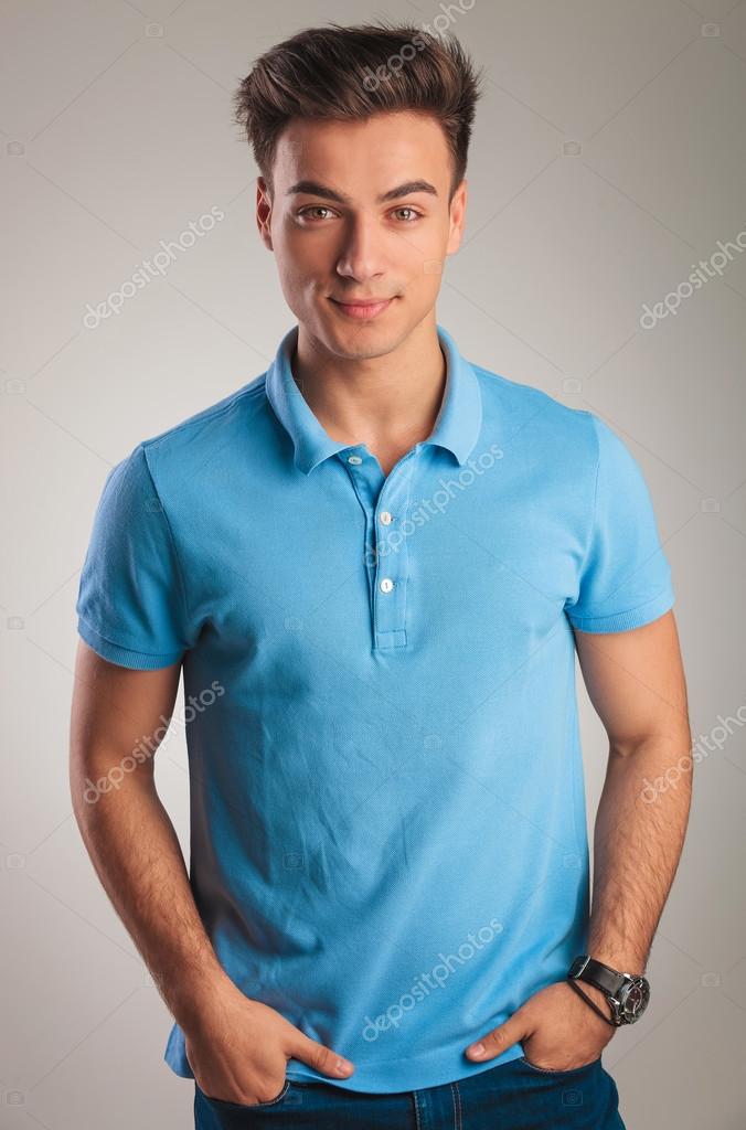 Casual man standing with hands in pockets Stock Photo by ©feedough ...