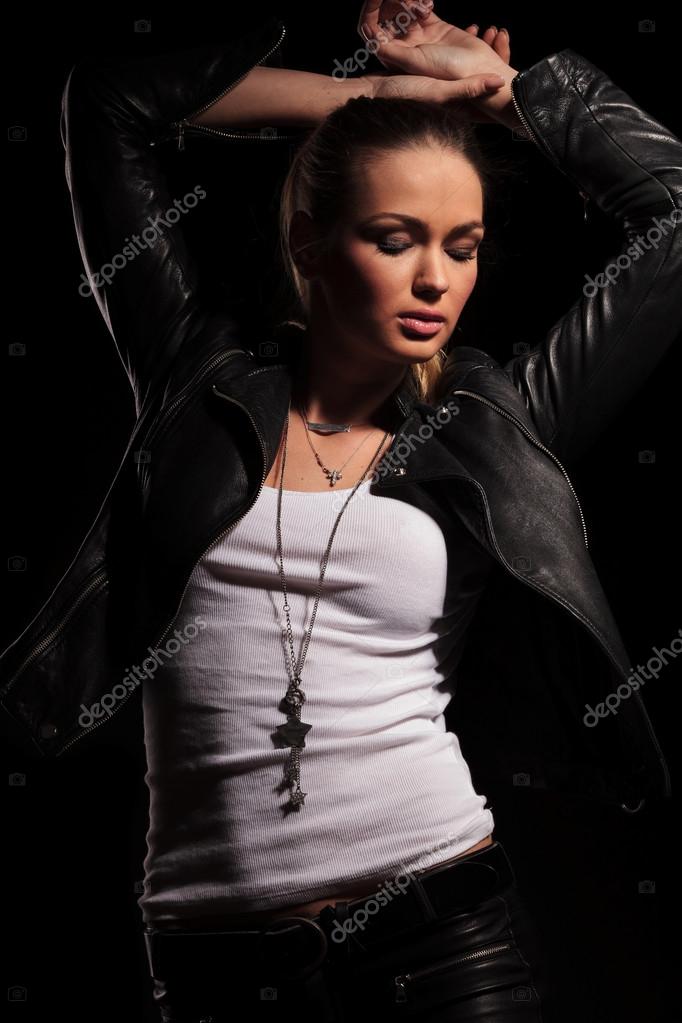 Beautiful woman in leather clothes Stock Photo by ©feedough 122349284