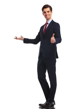 young business man presenting and making the ok sign