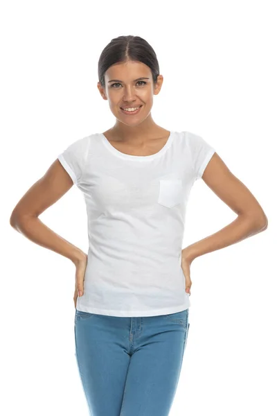 Happy Casual Woman Smiling Holding Waist While Standing White Studio — Stock Photo, Image