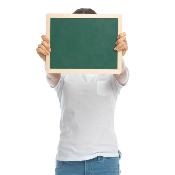 Young Casual Woman Covering Her Face Blackboard Standing White Studio — Stock Photo, Image