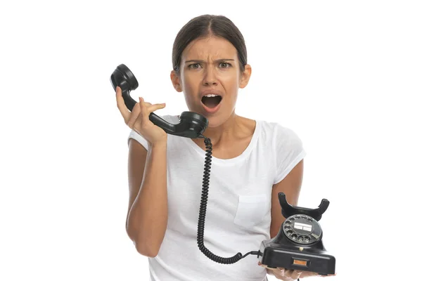 Eski Bir Telefonla Konuşan Soluk Soluğa Beyaz Stüdyo Arka Planında — Stok fotoğraf
