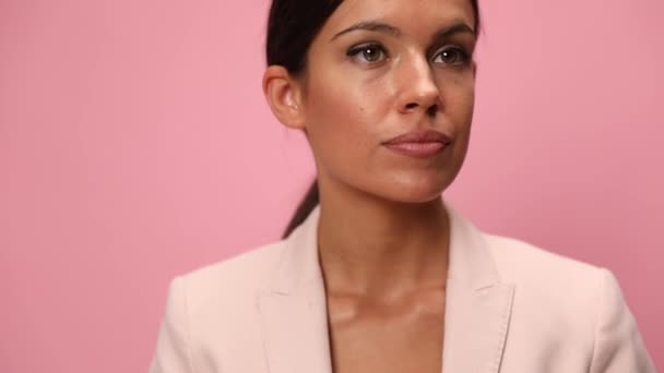 Pensive Young Woman Wearing Pink Suit Looking Side Thinking Analyzing — Stock Video