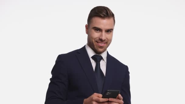 Smiling Businessman Navy Blue Suit Texting Reading Emails Phone Pointing — Stock Video