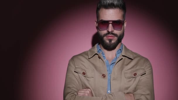 Serious Young Man Denim Shirt Wearing Sunglasses Beige Jacket Crossing — Stock Video