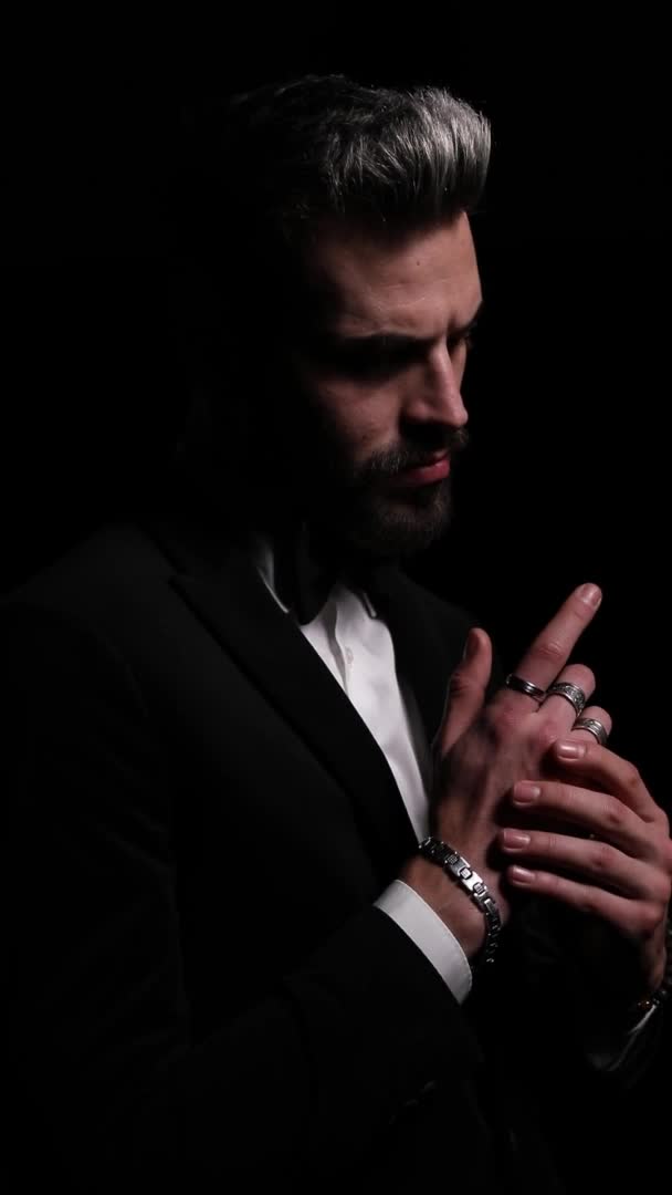 Seductive Elegant Man Touching Hands Sensually Looking Side Adjusting Bowtie — Stock Video