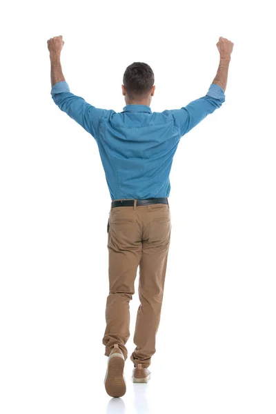 Rear View Casual Guy Raising His Fist Walking Away White — Stock Photo, Image