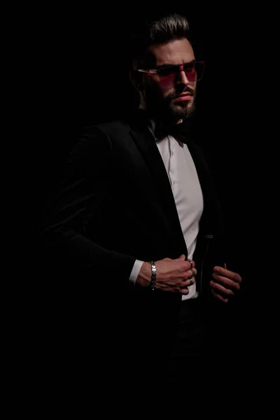 Mysterious Elegant Man Sunglasses Buttoning Black Velvet Tuxedo Looking Side — Stock Photo, Image