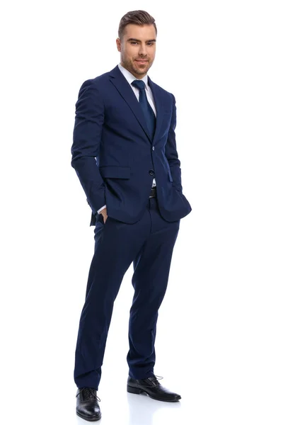 Smiling Young Man Navy Blue Suit Holding Hands Pockets Posing — Stock Photo, Image