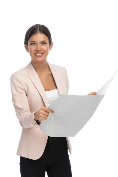 Proud Young Businesswoman Pink Jacket Reading Newspaper Smiling White Background — Stock Photo, Image