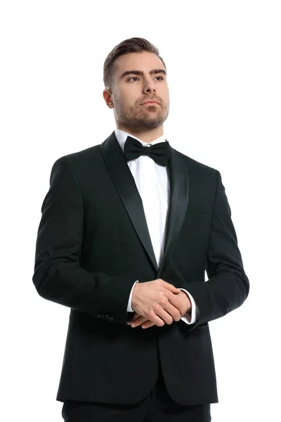 Attractive Bearded Man Blac Tuxedo Holding Hands Together Posing Straight — Stock Photo, Image