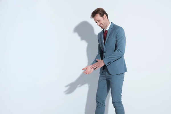 Side View Happy Man Blue Suit Looking Smiling Rubbing Palms — Stock Photo, Image