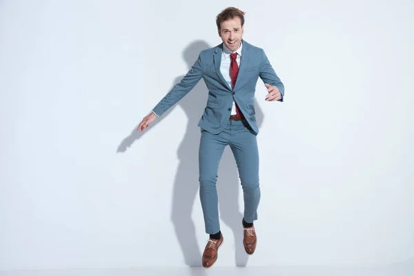 Full Body Picture Enthusiastic Young Businessman Elegant Blue Suit Jumping — Stock Photo, Image