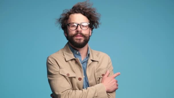 Confident Young Bearded Guy Crossing Arms Taking Glasses Starting Laugh — Stock Video