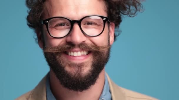 Attractive Bearded Fashion Model Beige Jacket Curly Hair Taking Glasses — Vídeos de Stock