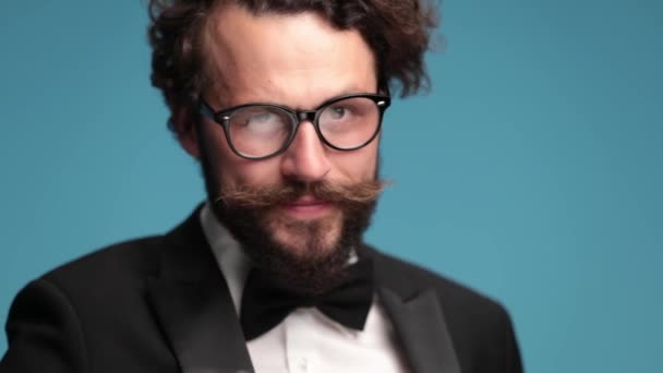 Long Bearded Young Man Wearing Black Tuxedo Glasses Nodding Holding — Stockvideo