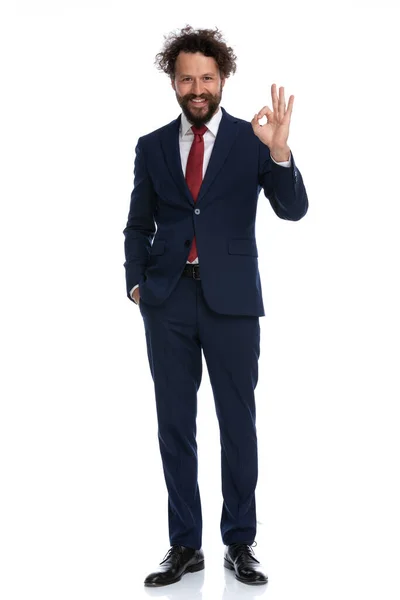 Sexy Businessman Giving Sign Holding One Hand Pocket White Background — Stock Photo, Image