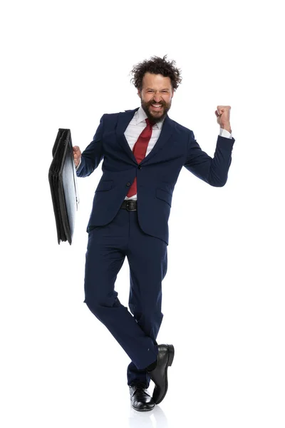 Young Businessman Crossing His Legs Celebrating Succes Holding Briefcase White — Stock Photo, Image