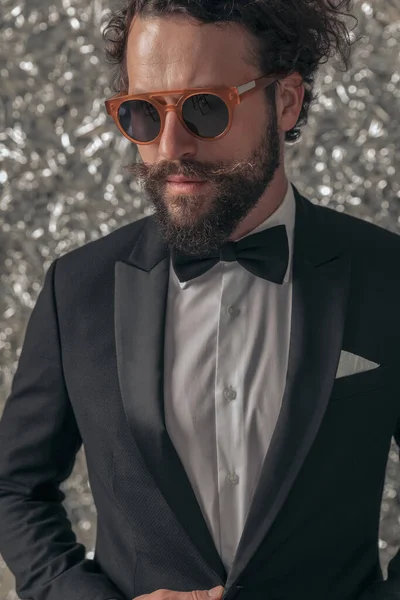 Cool Elegant Man Black Tuxedo Sunglasses Looking Side Fixing Jacket — Stock Photo, Image