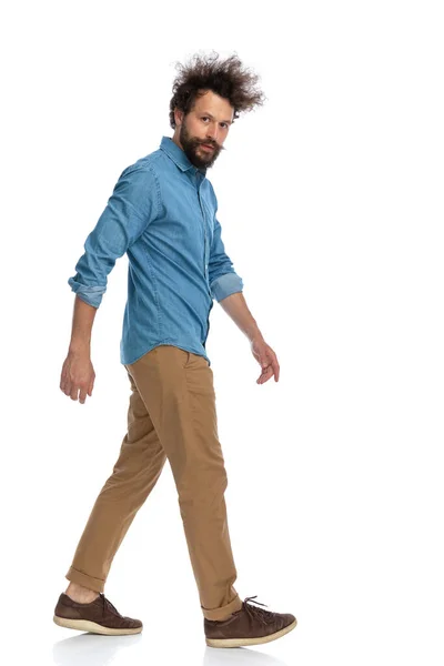 Young Casual Man Walking Side White Studio Background — Stock Photo, Image