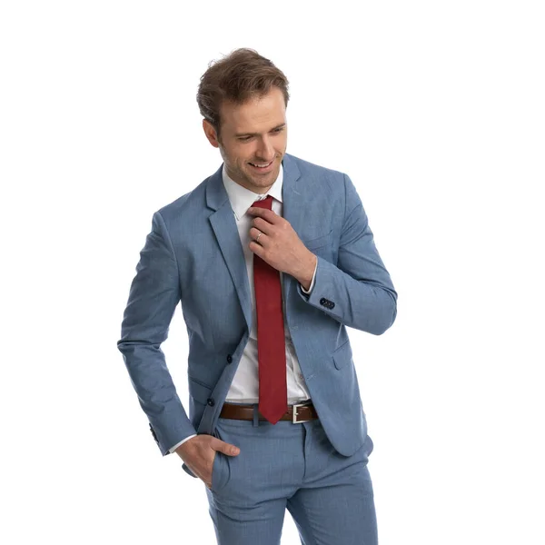 Portrait Handsome Man Blue Suit Fixing Tie Holding Hand Pocket — Stock Photo, Image