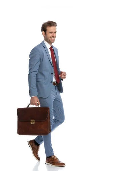 Side View Elegant Businessman Blue Suit Smiling While Holding Suitcase — Stock Photo, Image