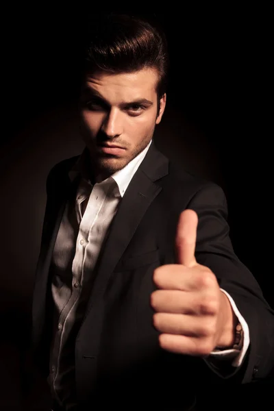 Elegant fashion manmaking the ok  sign — Stock Photo, Image