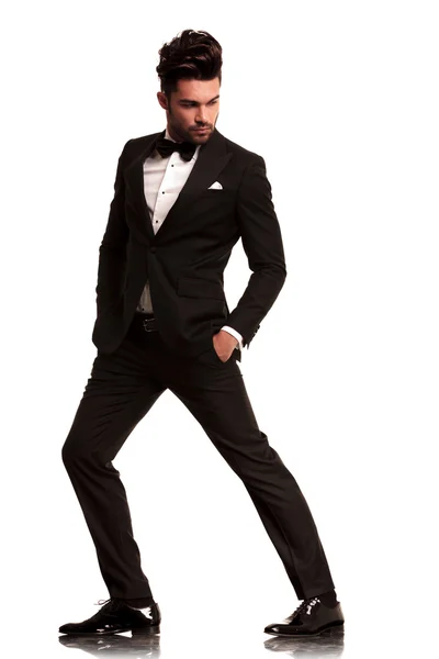 Fashion man in tuxedo looking to side — Stock Photo, Image