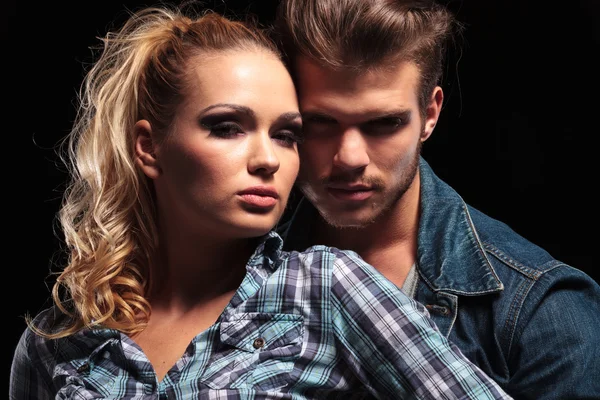 Young couple posing and looking at the camera Royalty Free Stock Images