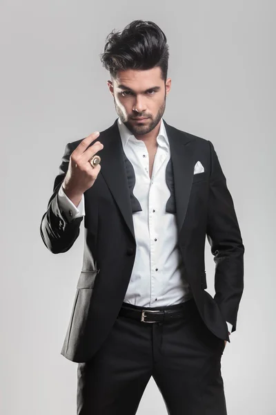 Young man in tuxedo looking at the camera — Stock Photo, Image