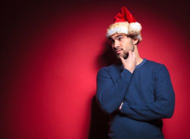 Sakalını tırmalamak süre genç santa düşünme