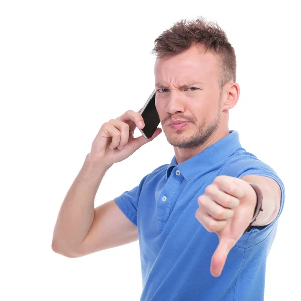 Casual young man receives bad news — Stock Photo, Image