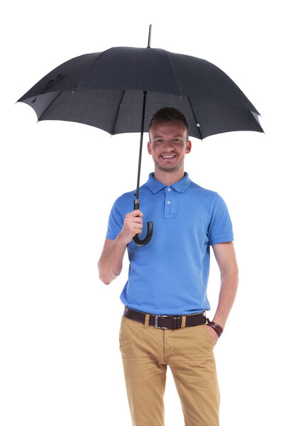 casual young man with umbrella in hand