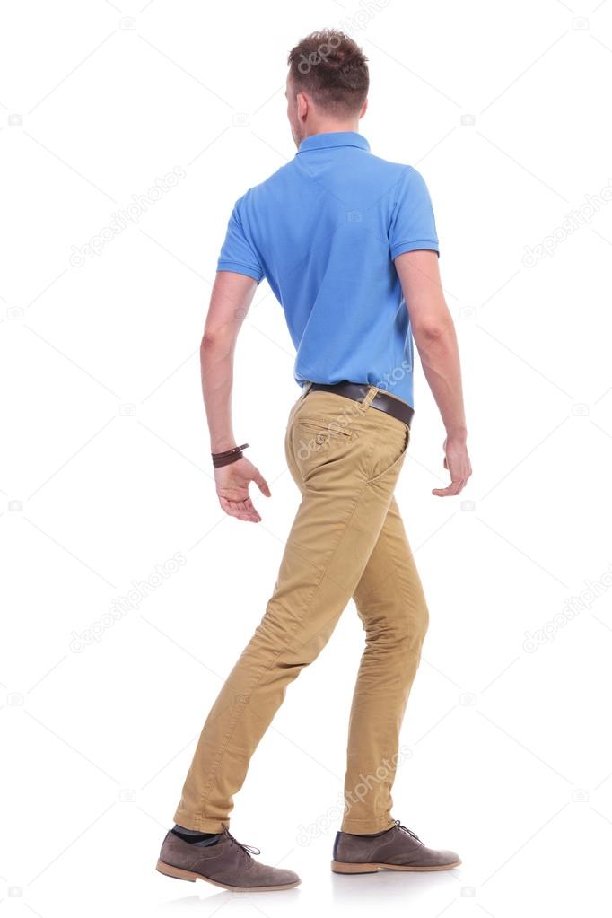 casual young man turns his back