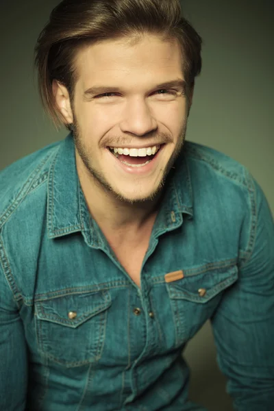 Happy young fashion man laughing — Stock Photo, Image