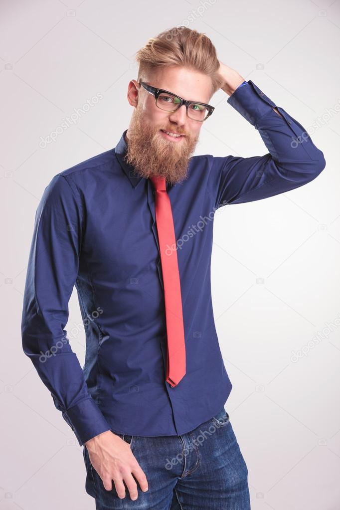 young casual man smiling at the camera 