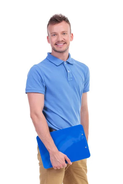 Young man holding a clipboard — Stock Photo, Image