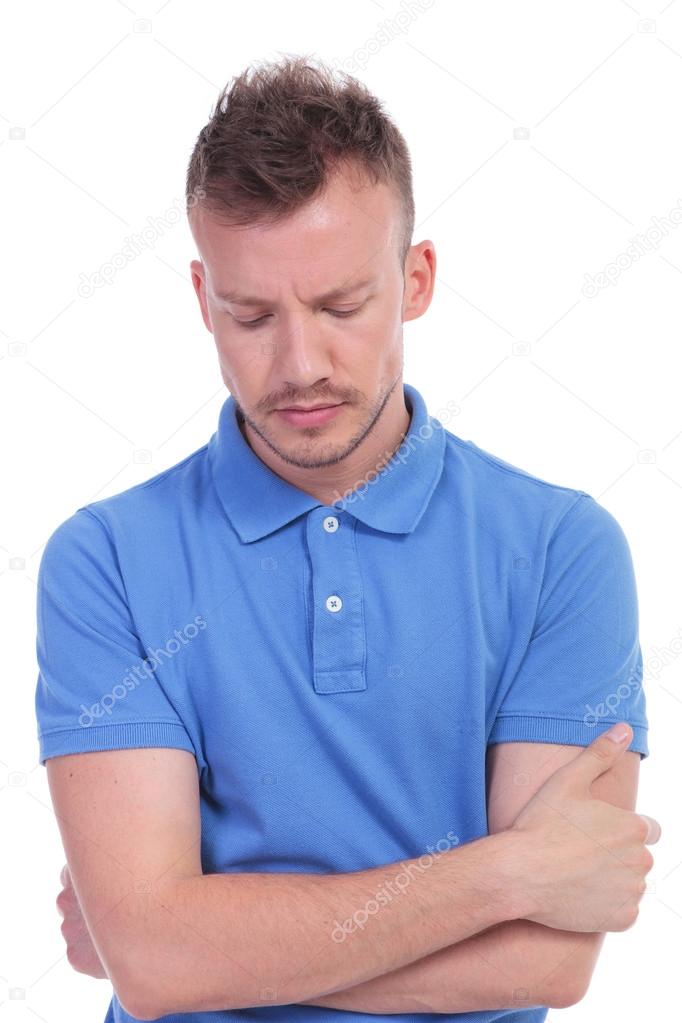 casual young man looking worried