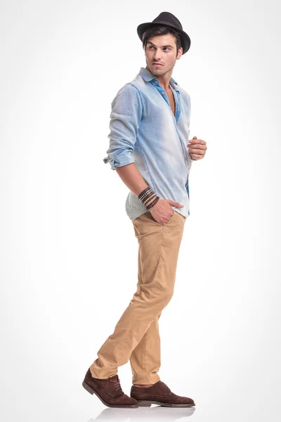 Young casual man holding one hand in his pocket — Stock Photo, Image