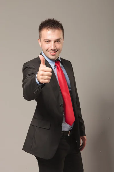 Happy young business man celebrating a succes — Stock Photo, Image