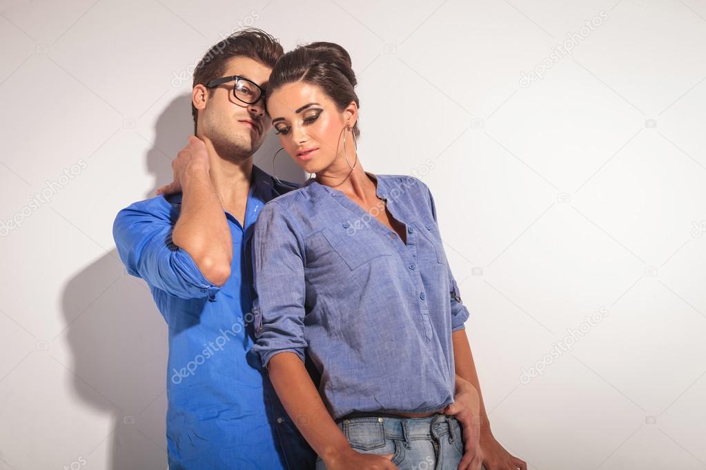 Young fashion woman leaning on her lover