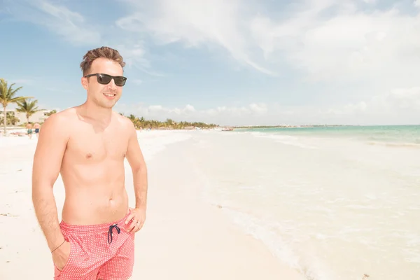 Handsome life guard looking away — Stock Photo, Image