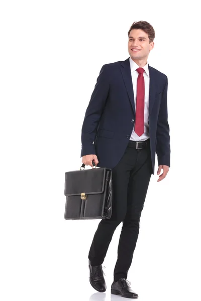 Happy young business man walking — Stock Photo, Image