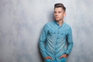 Fashion young man looking away