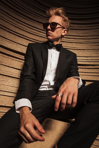 Down view of a young business man looking away — Stock Photo, Image